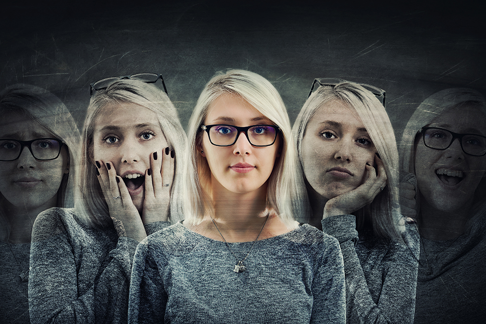 A thoughtful image of a person sitting alone with their head in their hands, symbolizing the struggle with addiction and behavioral challenges.